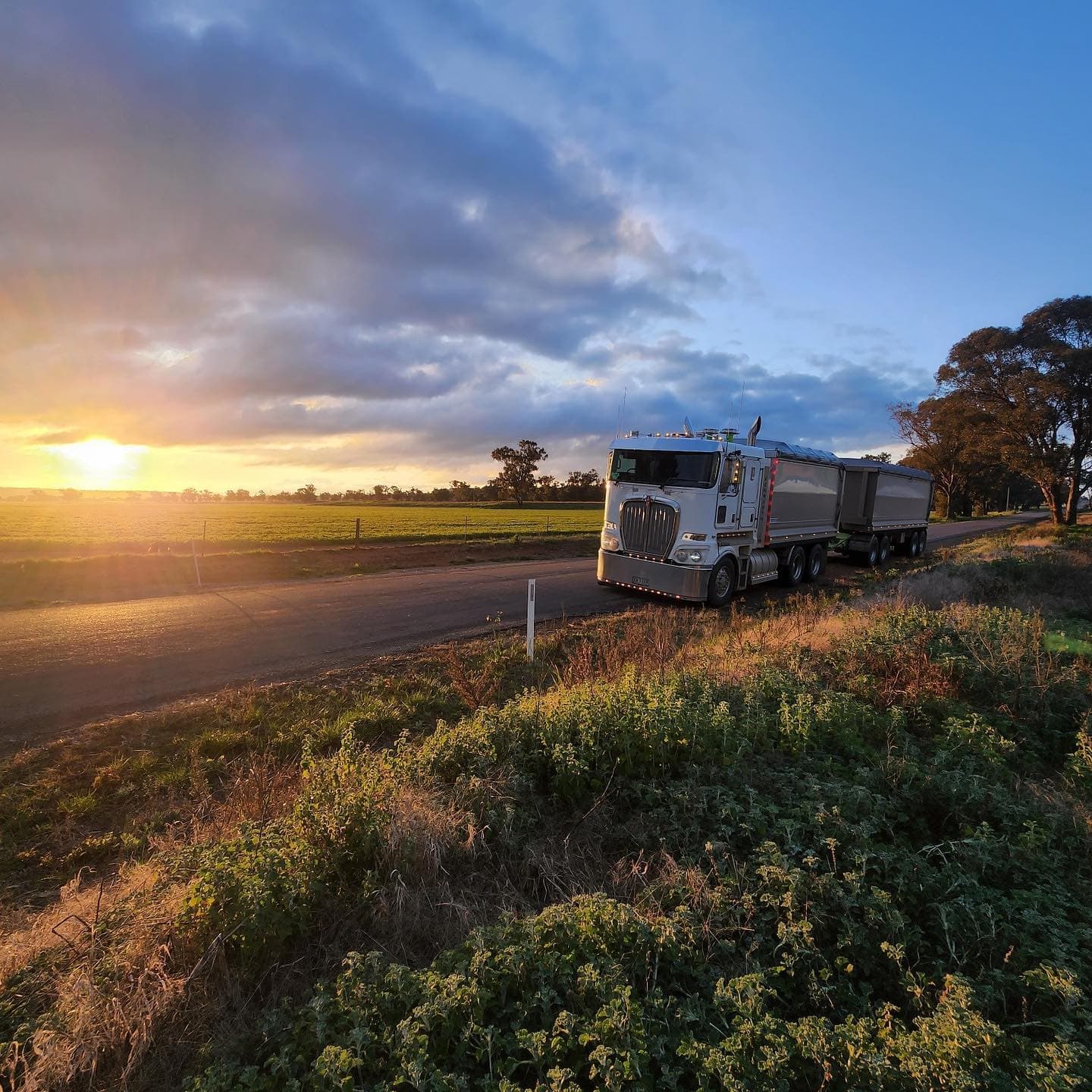 52nd Earthworx haulage truck at sunset